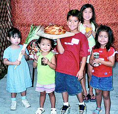 A few of the children of the Asian-American Havurah celebrate Sukkot. Photo by Alicia Messing