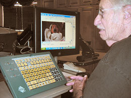 Al Plotkin views his days-old great-granddaughter via e-mail on a new computer system at Kivel Campus of Care.